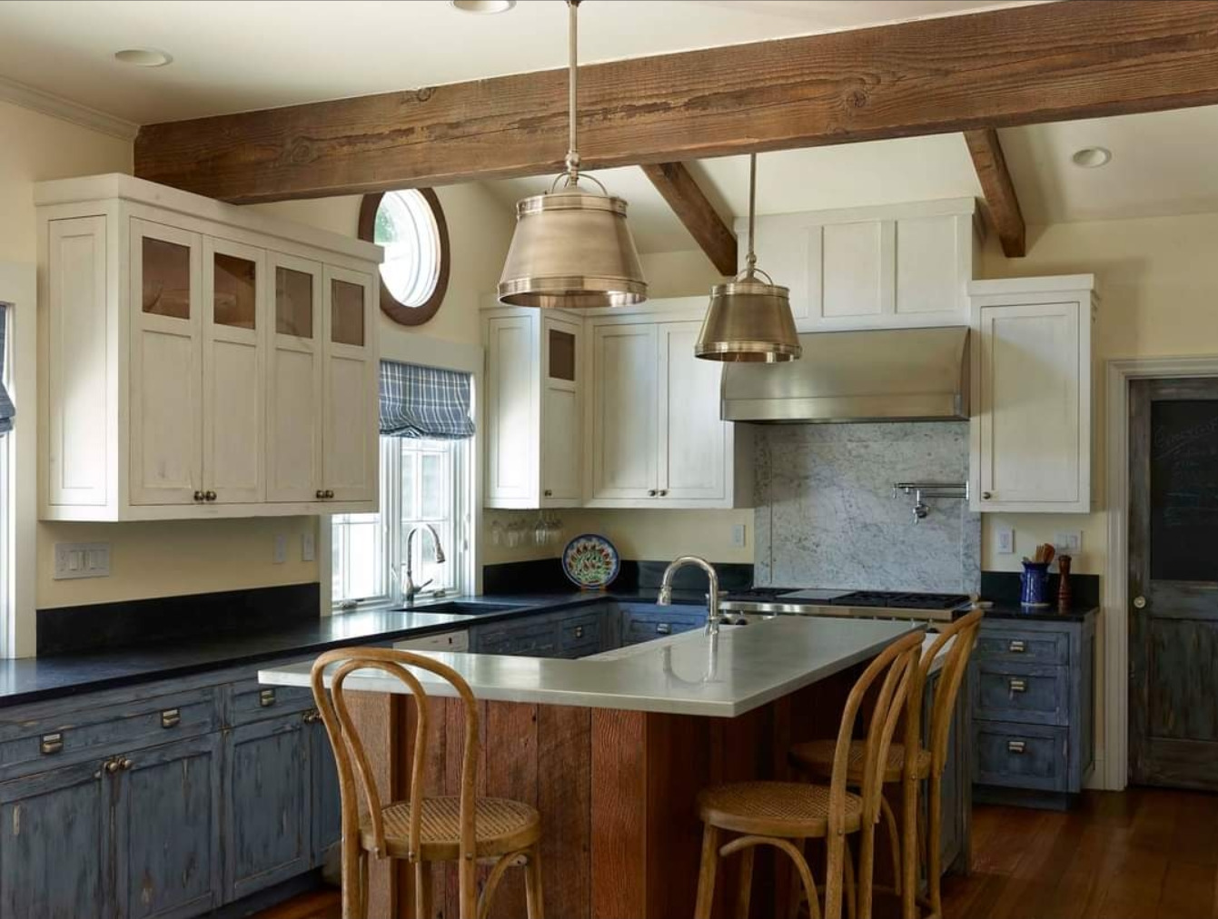 Refinished white kitchen with blue lower cabinets